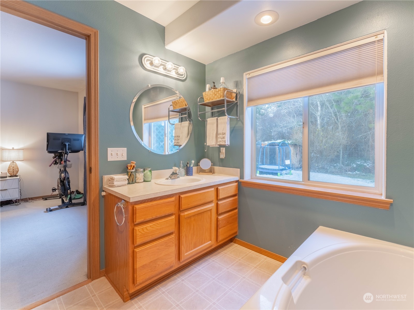 14918 Burkey Street Entiat, WA 98822 - Photo 22 of 39 a view of a bedroom with a bed and a mirror