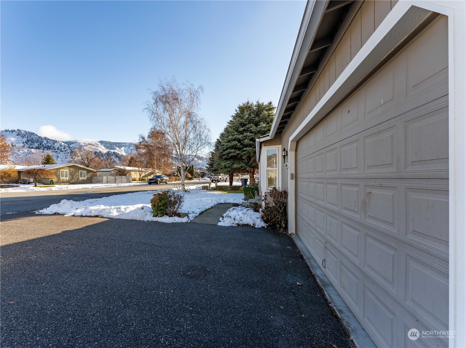14918 Burkey Street Entiat, WA 98822 - Photo 37 of 39 a view of street with view of car parked on street side