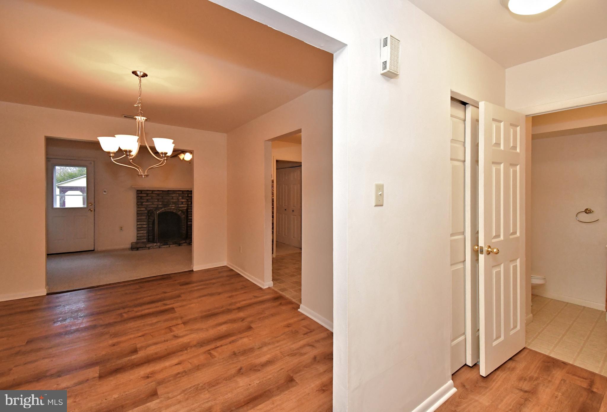 8 Pennington Lane Quakertown, PA 18951 - Photo 11 of 58 a view of an empty room with a fireplace and a window