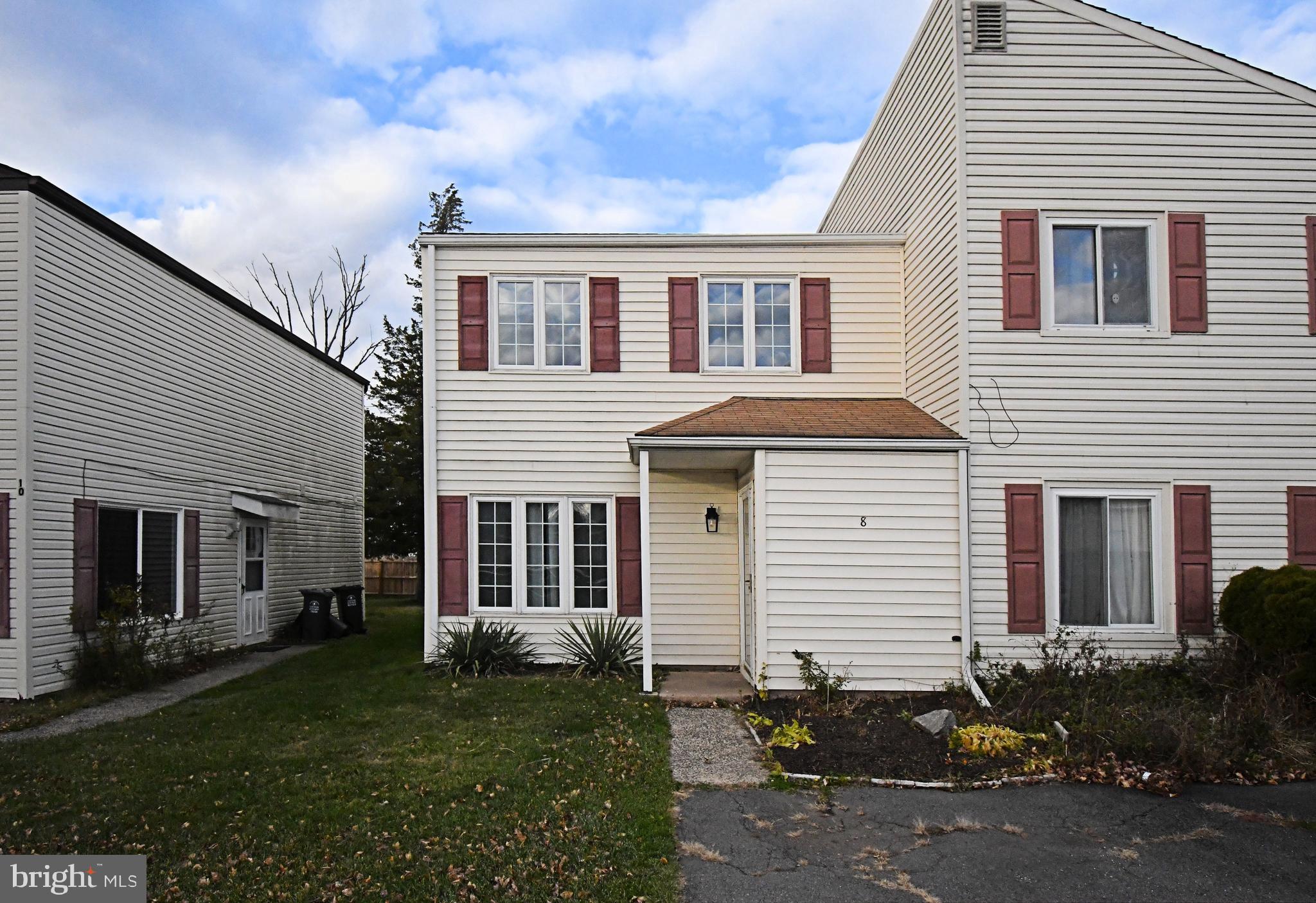 8 Pennington Lane Quakertown, PA 18951 - Photo 2 of 58 a front view of a house with a garden