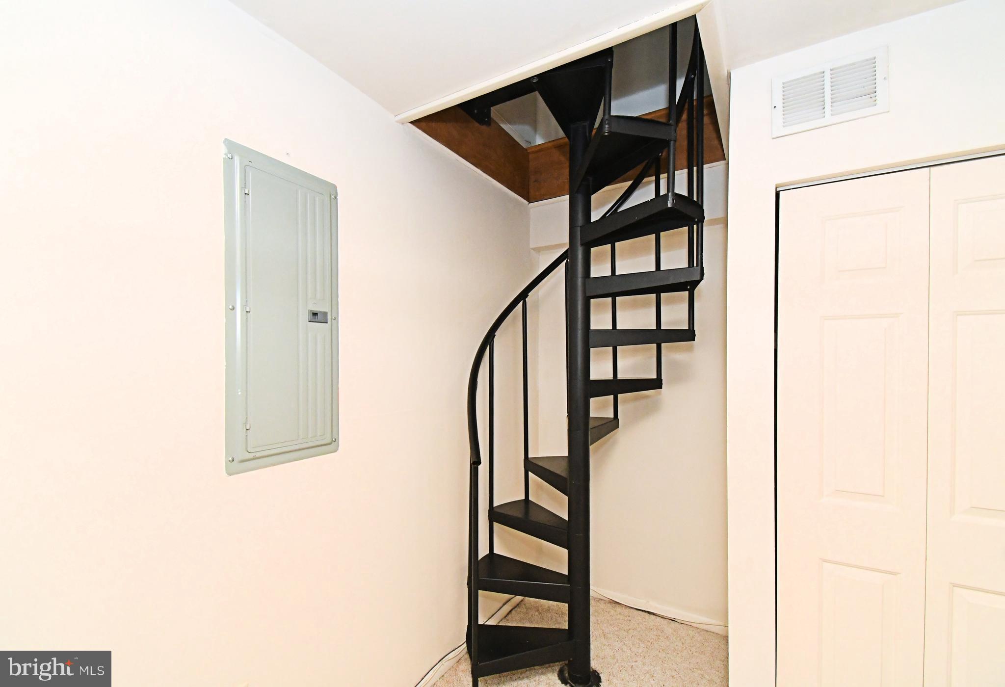 8 Pennington Lane Quakertown, PA 18951 - Photo 27 of 58 a view of staircase with white walls and a painting on the wall