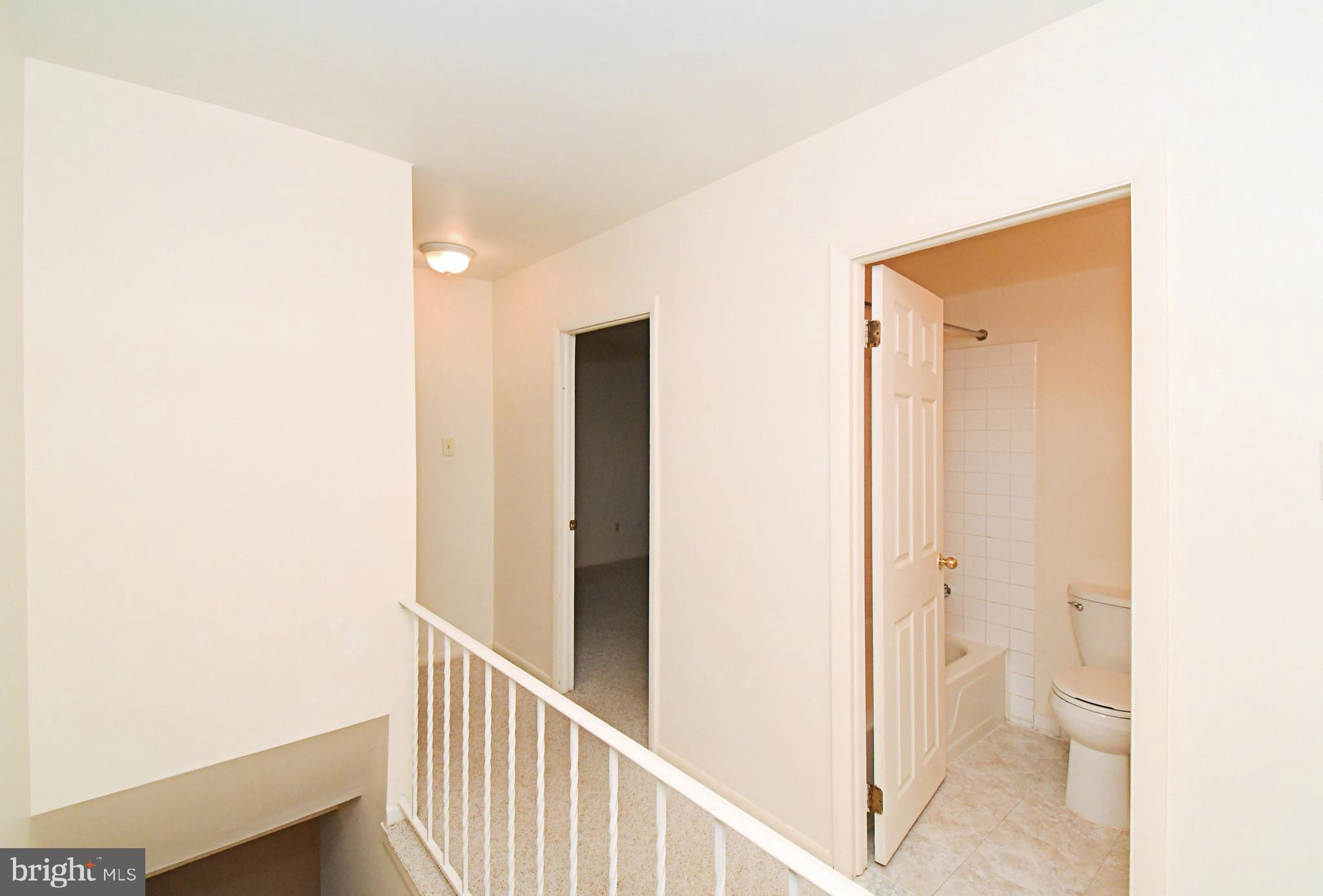 8 Pennington Lane Quakertown, PA 18951 - Photo 29 of 58 a view of a bathroom from a hallway