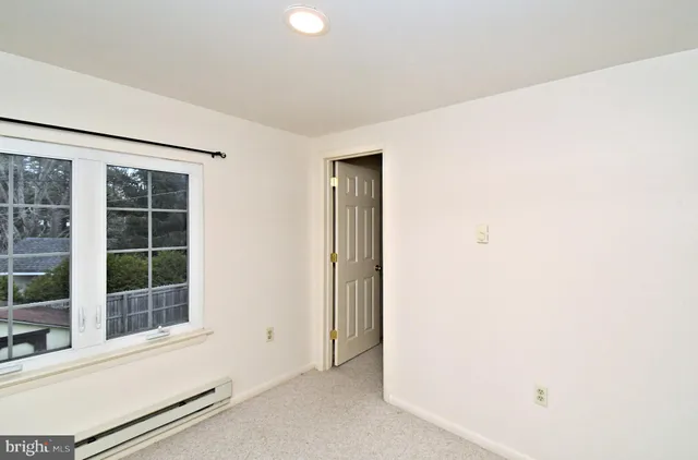 a bathroom with a sink toilet and vanity