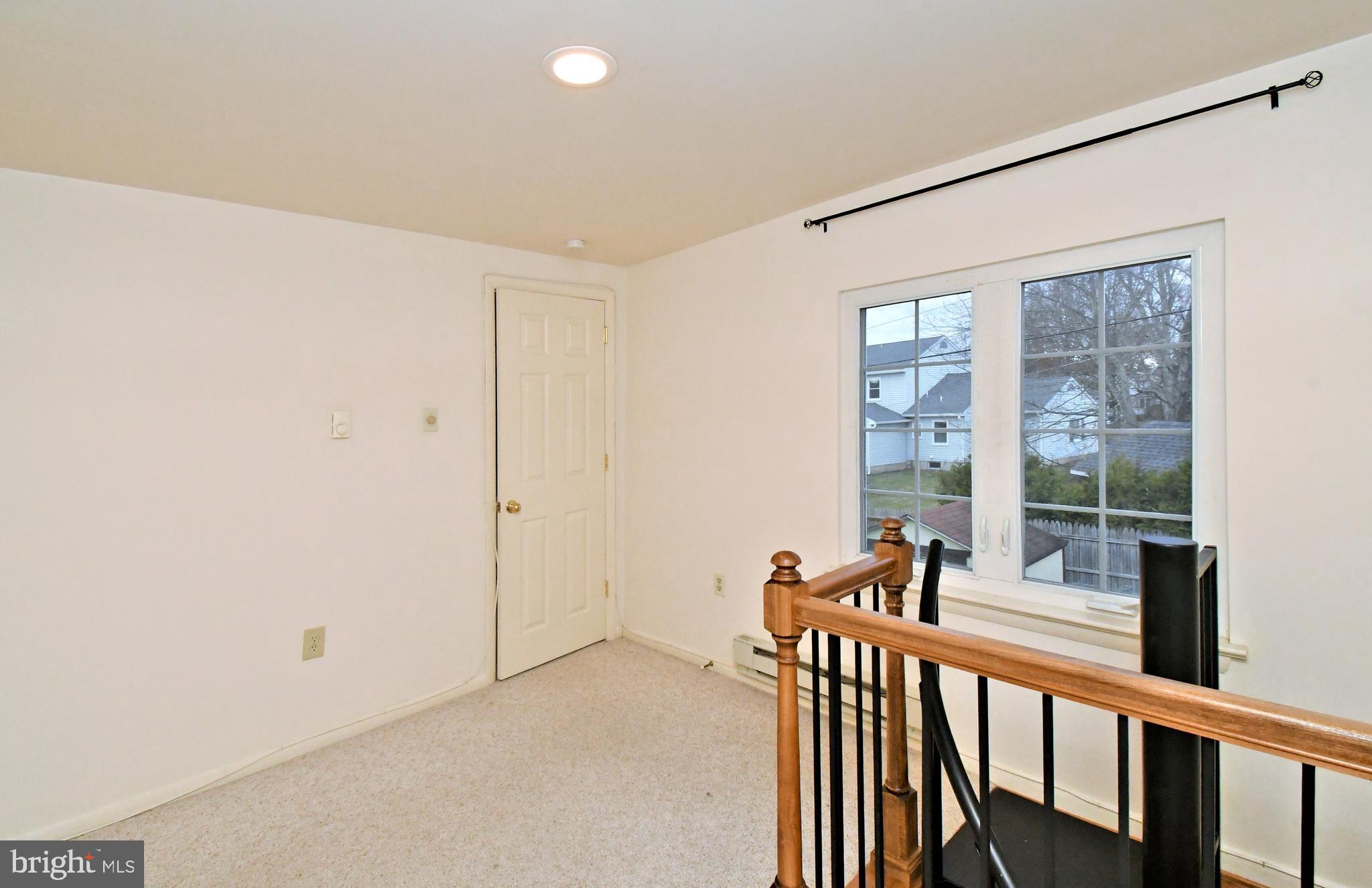 8 Pennington Lane Quakertown, PA 18951 - Photo 41 of 58 a view of a room with wooden floor and windows