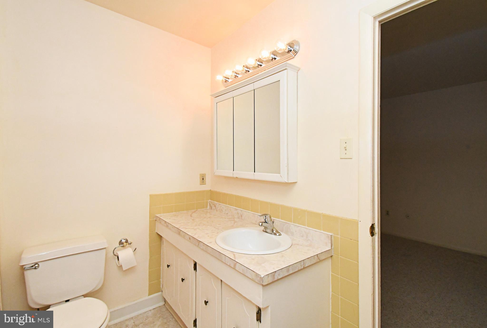 8 Pennington Lane Quakertown, PA 18951 - Photo 44 of 58 a bathroom with a sink toilet and vanity