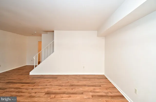a view of a big room with wooden floor