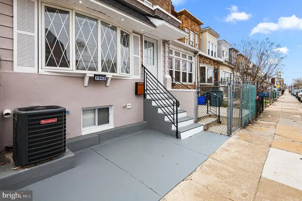 a view of a building with a bench
