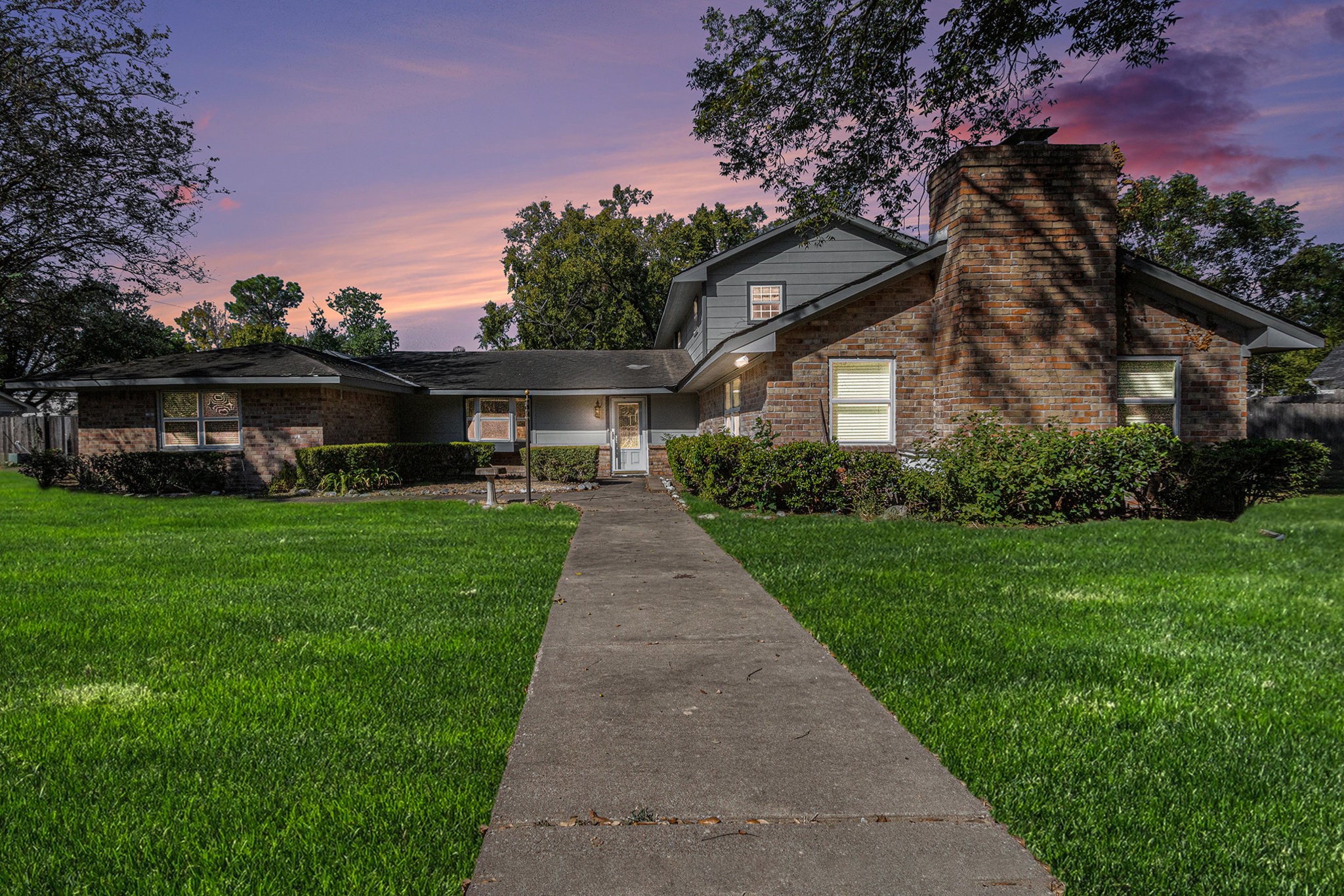 4709 Frontier Drive Houston, TX 77041 - Photo 1 of 20 a front view of a house with a yard and green space