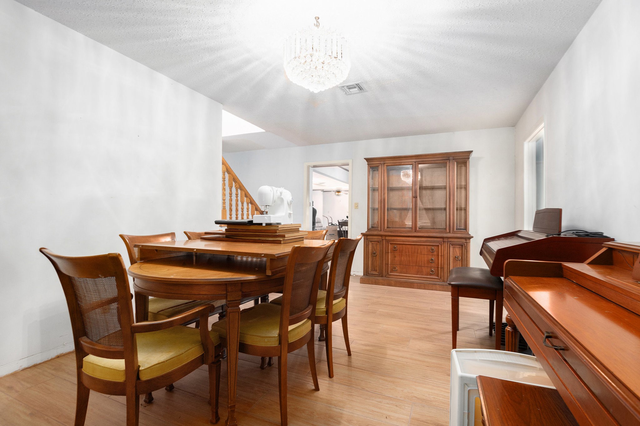 4709 Frontier Drive Houston, TX 77041 - Photo 9 of 18 a view of a dining room with furniture and wooden floor