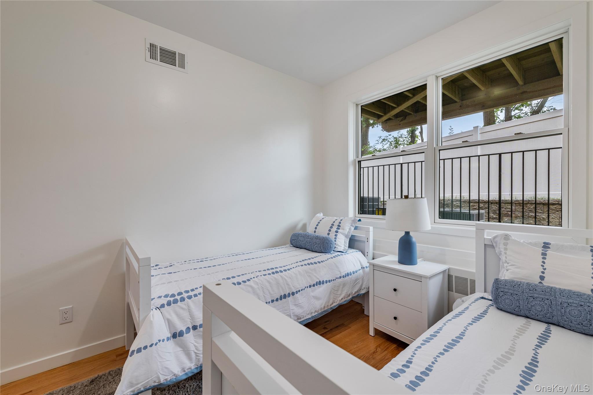 17 Union Road, Unit 110 Spring Valley, NY 10977 - Photo 13 of 16 a bed room with a bed and a window