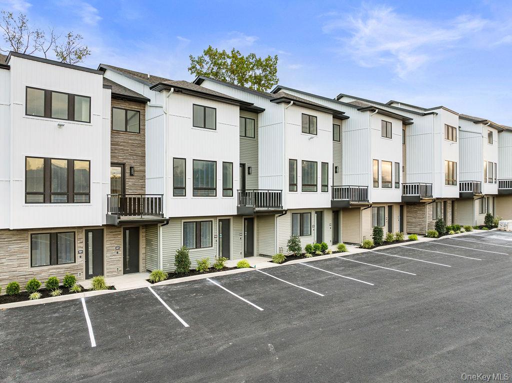 17 Union Road, Unit 110 Spring Valley, NY 10977 - Photo 16 of 16 a front view of a building with a street