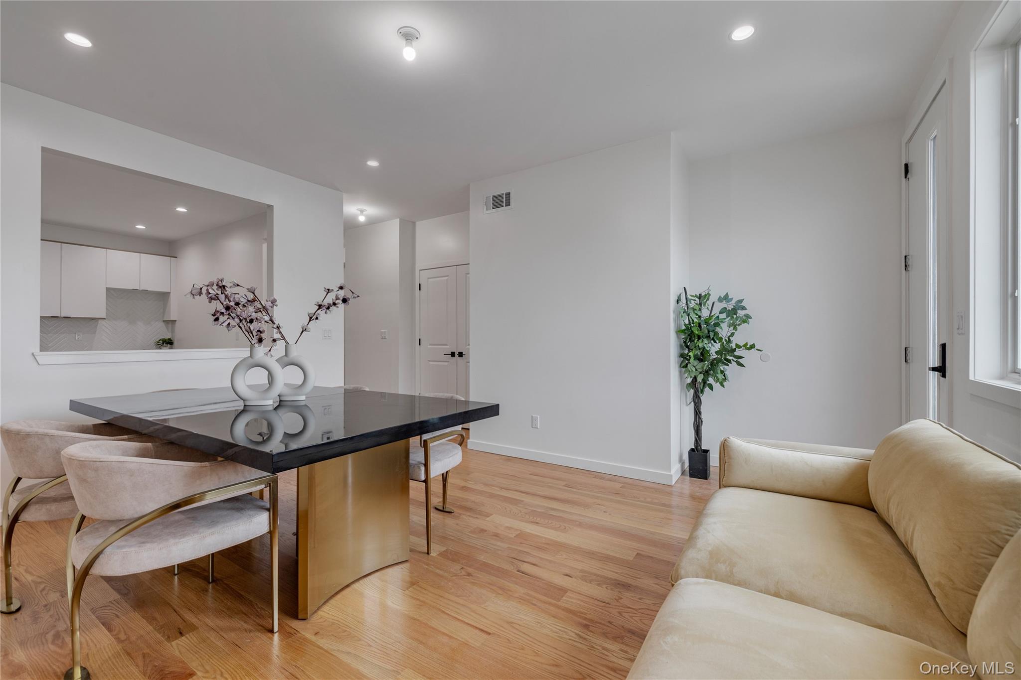 17 Union Road, Unit 110 Spring Valley, NY 10977 - Photo 4 of 16 a view of a livingroom with furniture and a chandelier
