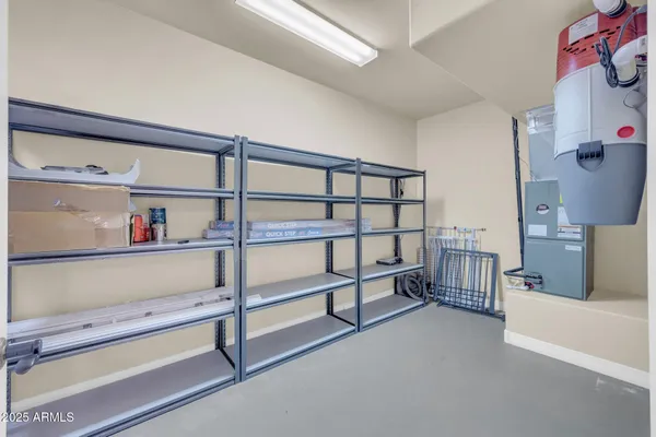 a view of backyard with a garden and trees