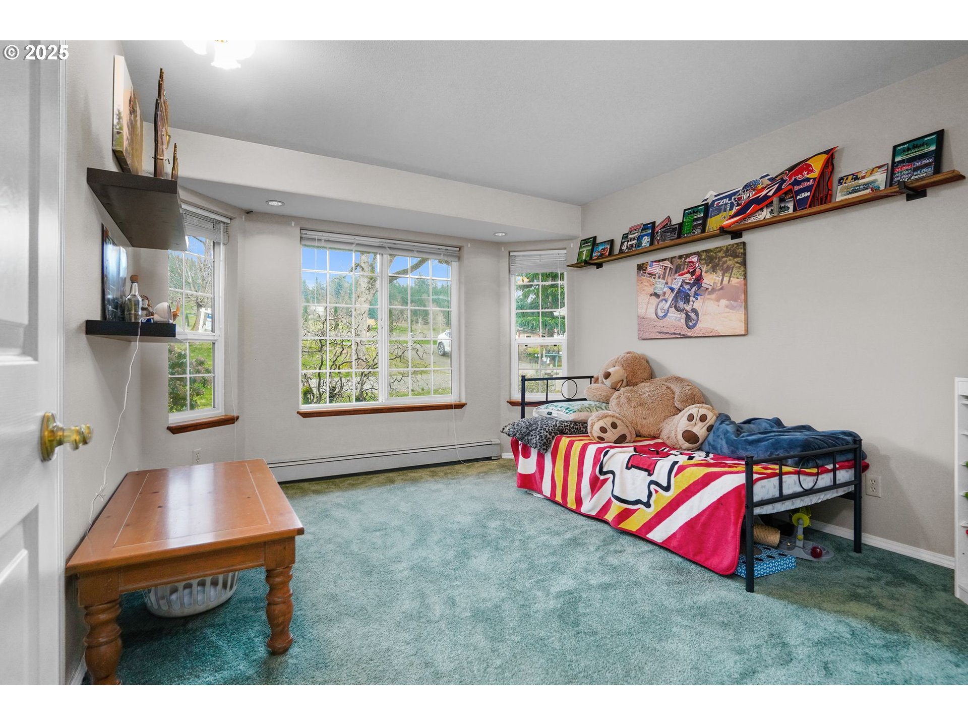 17576 North Abiqua Road Silverton, OR 97381 - Photo 13 of 40 a living room with furniture and a flat screen tv