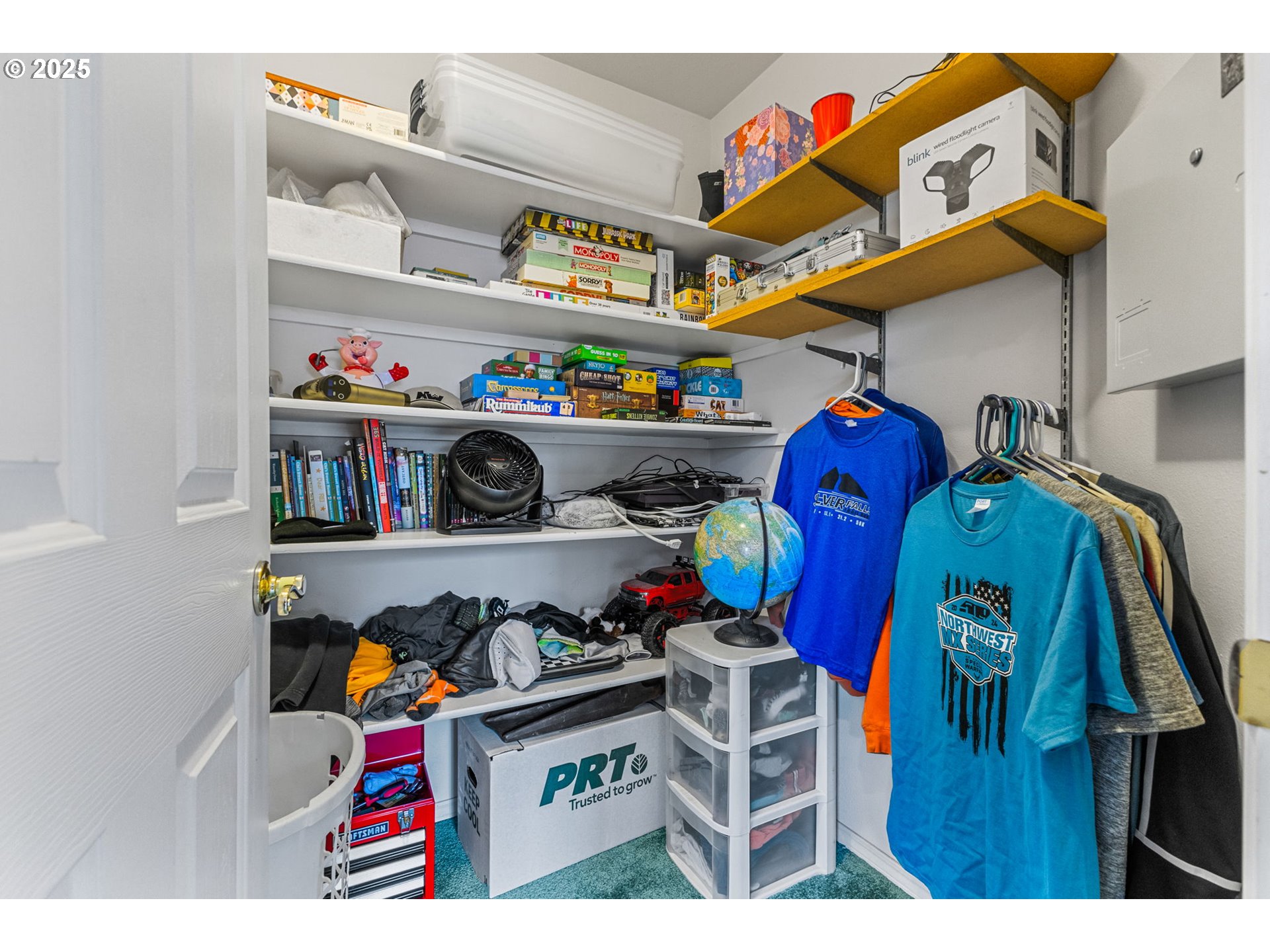 17576 North Abiqua Road Silverton, OR 97381 - Photo 17 of 40 a view of walk in closet with clothes and shoes