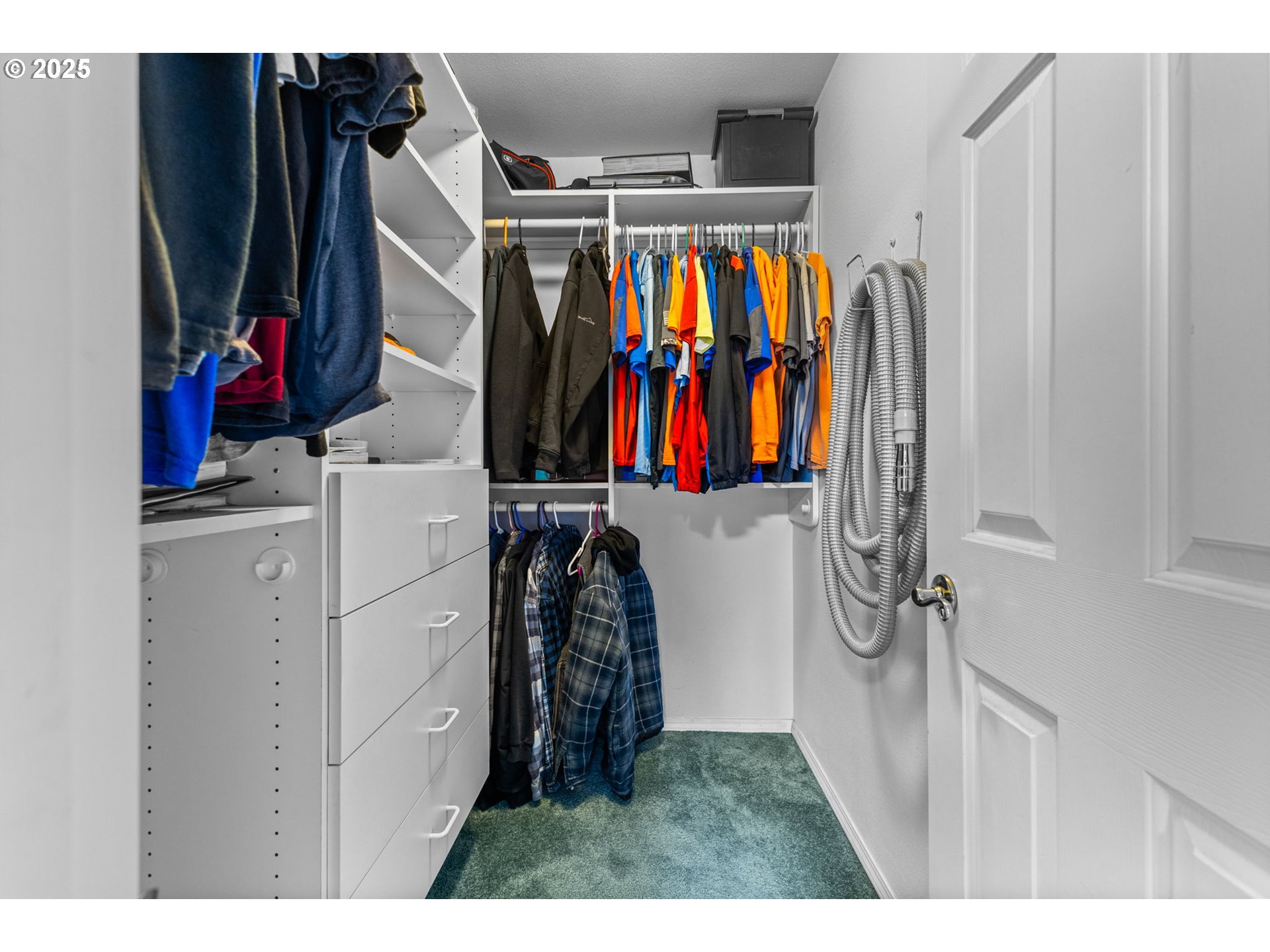 17576 North Abiqua Road Silverton, OR 97381 - Photo 20 of 40 a view of walk in closet with clothes and shoes