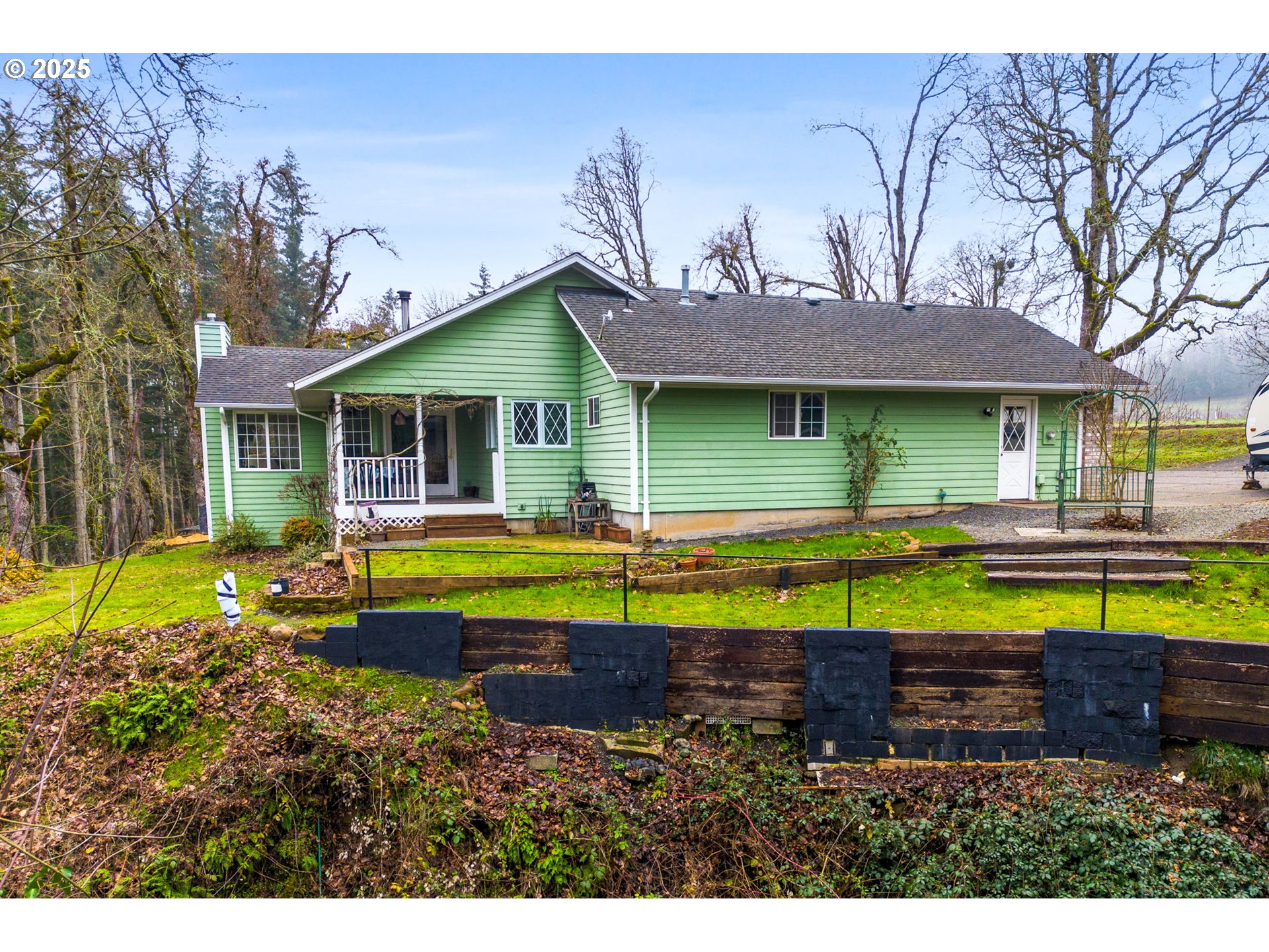 17576 North Abiqua Road Silverton, OR 97381 - Photo 38 of 40 a view of a house with swimming pool and a yard