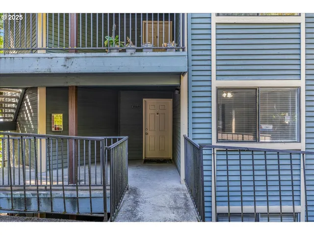 a view of a brick house with a window