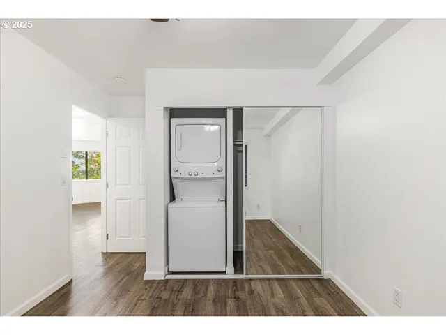 a view of entryway with wooden floor