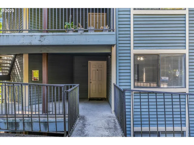 a view of a brick house with a window