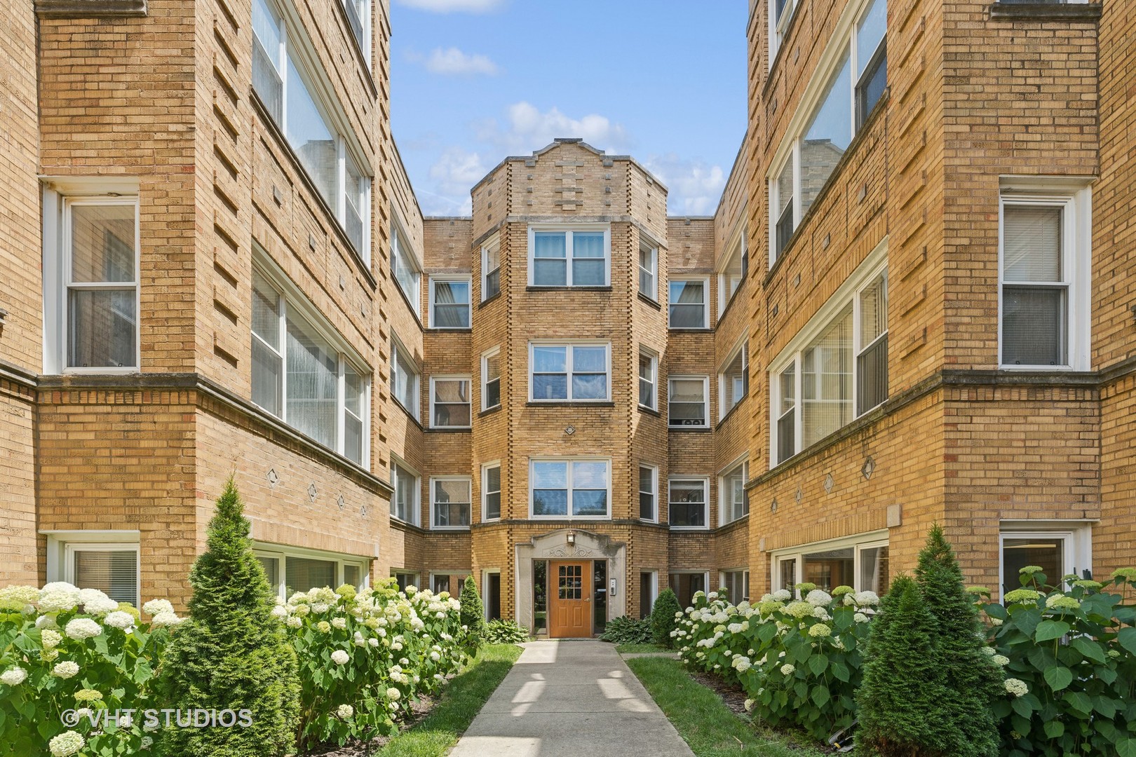 4915 North Avers Avenue, Unit 2CS Chicago, IL 60625 - Photo 1 of 18 front view of a brick building