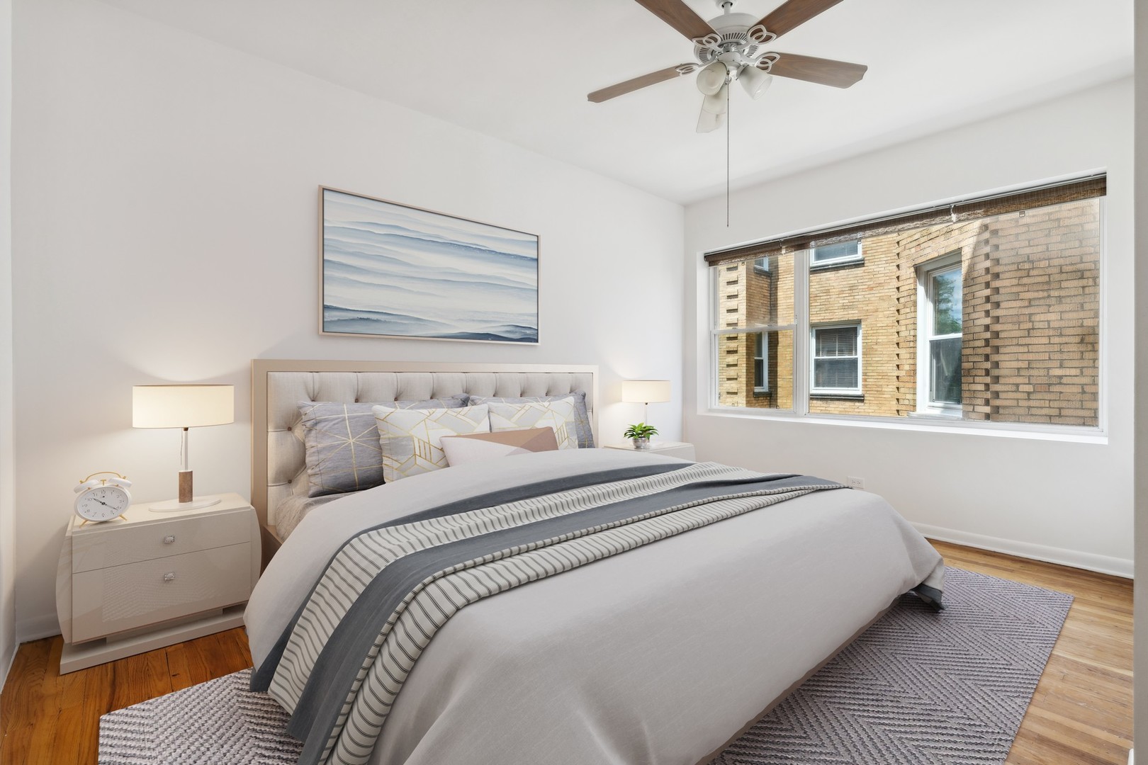 4915 North Avers Avenue, Unit 2CS Chicago, IL 60625 - Photo 11 of 18 a bedroom with bed and window