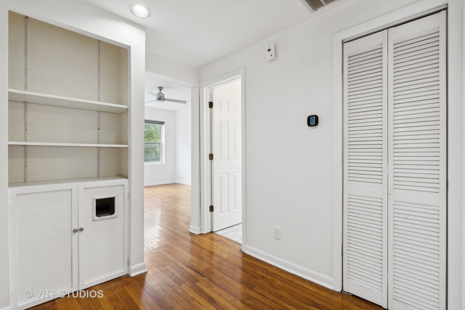4915 North Avers Avenue, Unit 2CS Chicago, IL 60625 - Photo 2 of 18 a view of a livingroom with wooden floor