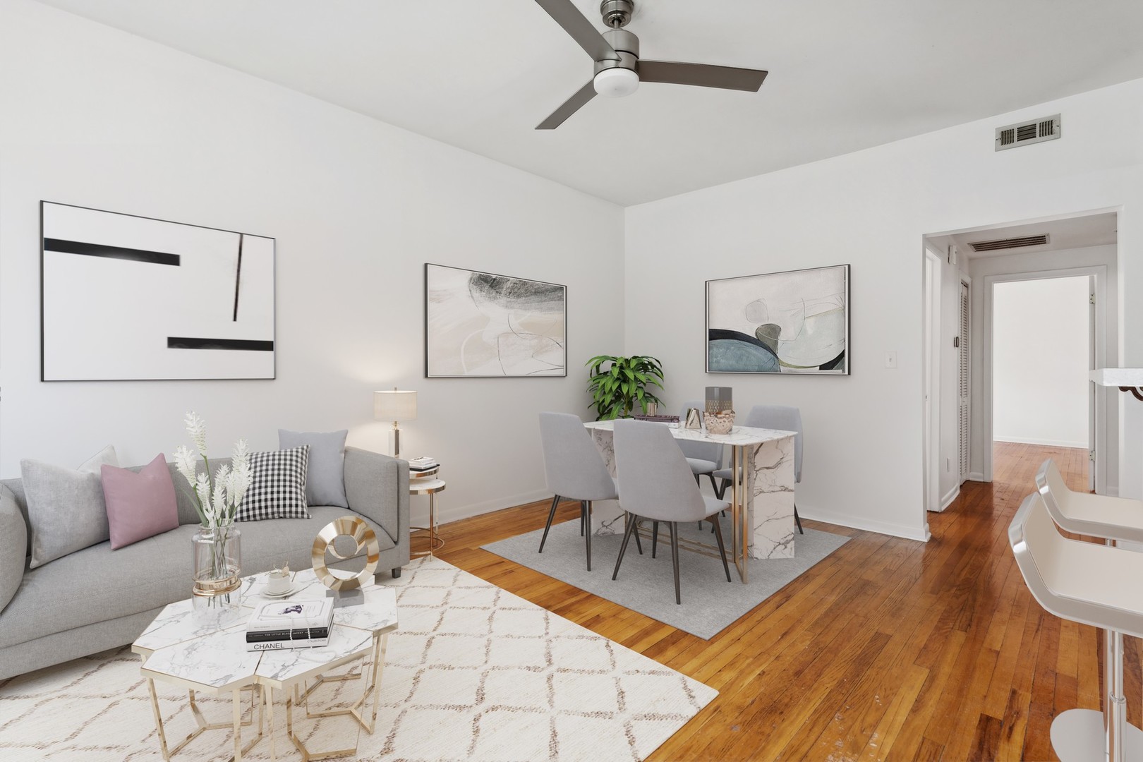 4915 North Avers Avenue, Unit 2CS Chicago, IL 60625 - Photo 6 of 18 a view of a dining room with furniture and wooden floor