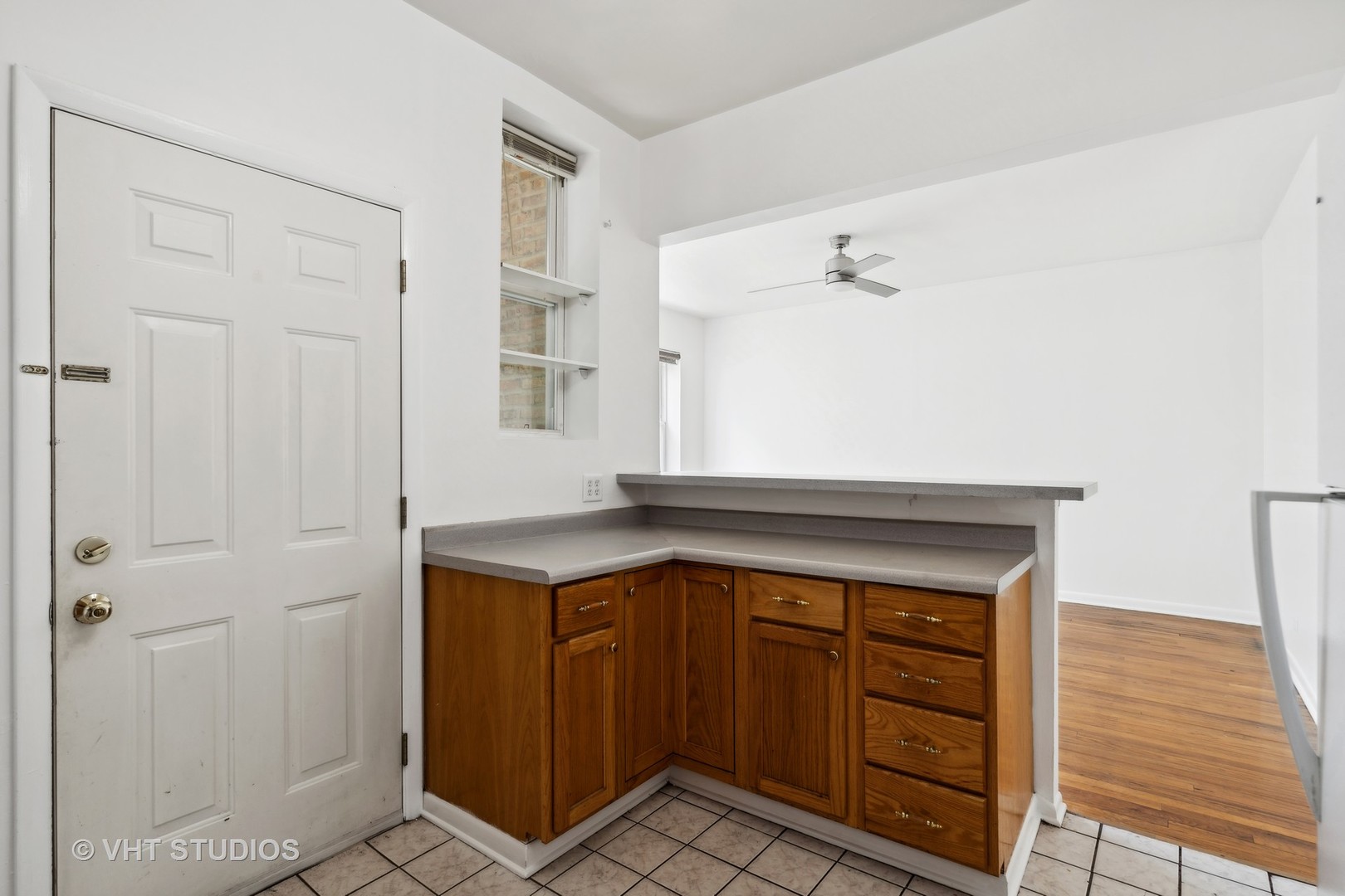 4915 North Avers Avenue, Unit 2CS Chicago, IL 60625 - Photo 10 of 18 a view of a kitchen with cabinets