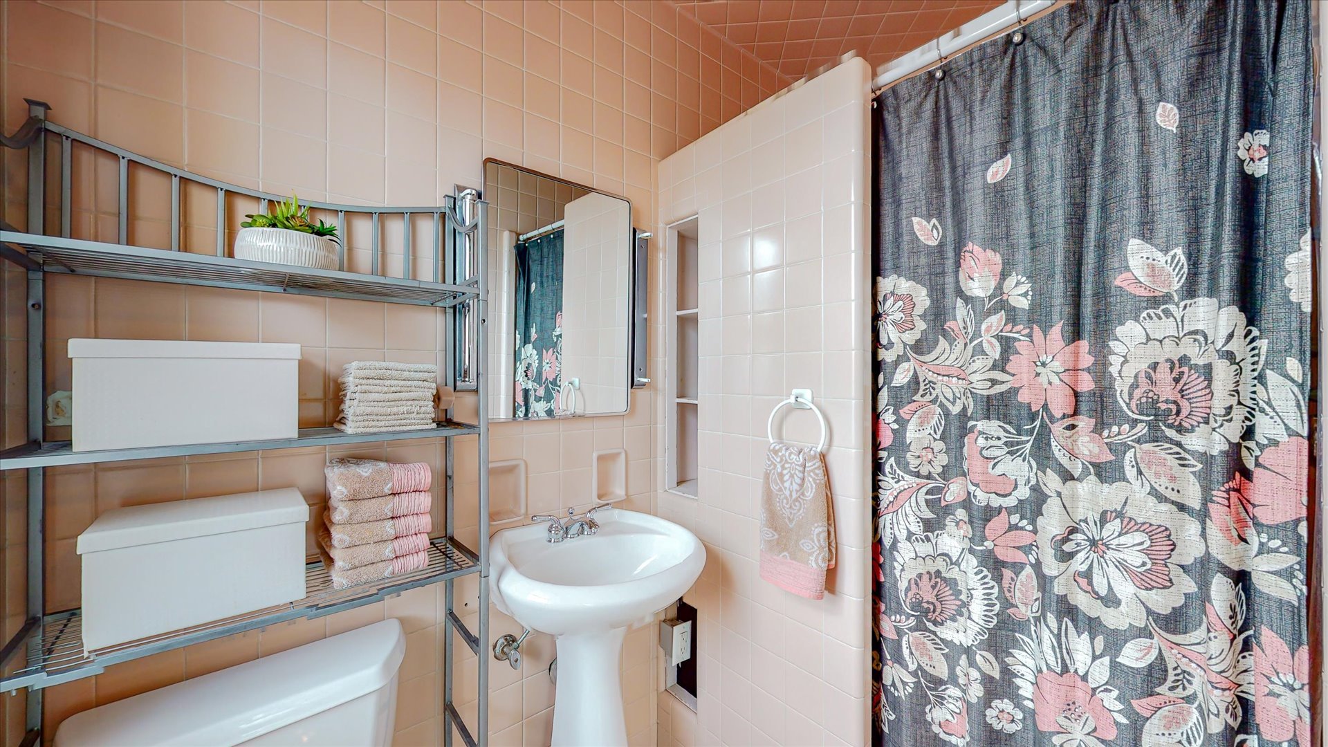 506 North Edwin Street Champaign, IL 61821 - Photo 12 of 45 a bathroom with a sink and mirror with toilet