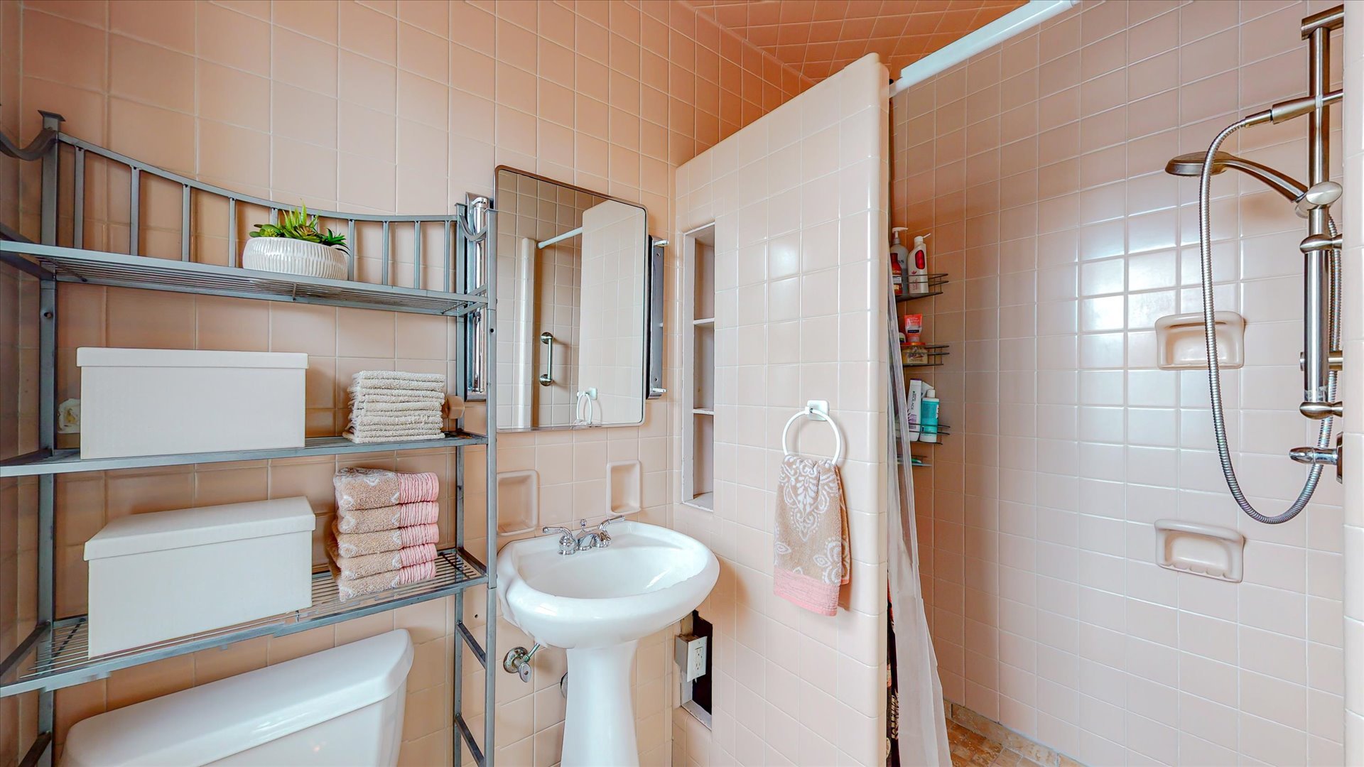 506 North Edwin Street Champaign, IL 61821 - Photo 13 of 45 a bathroom with a sink a toilet and shower