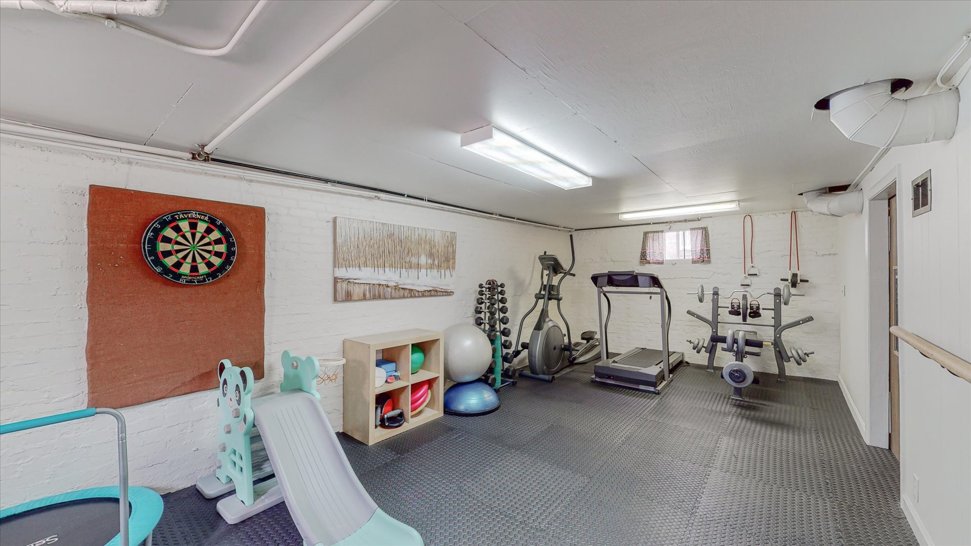 506 North Edwin Street Champaign, IL 61821 - Photo 21 of 45 a view of a room with gym equipment