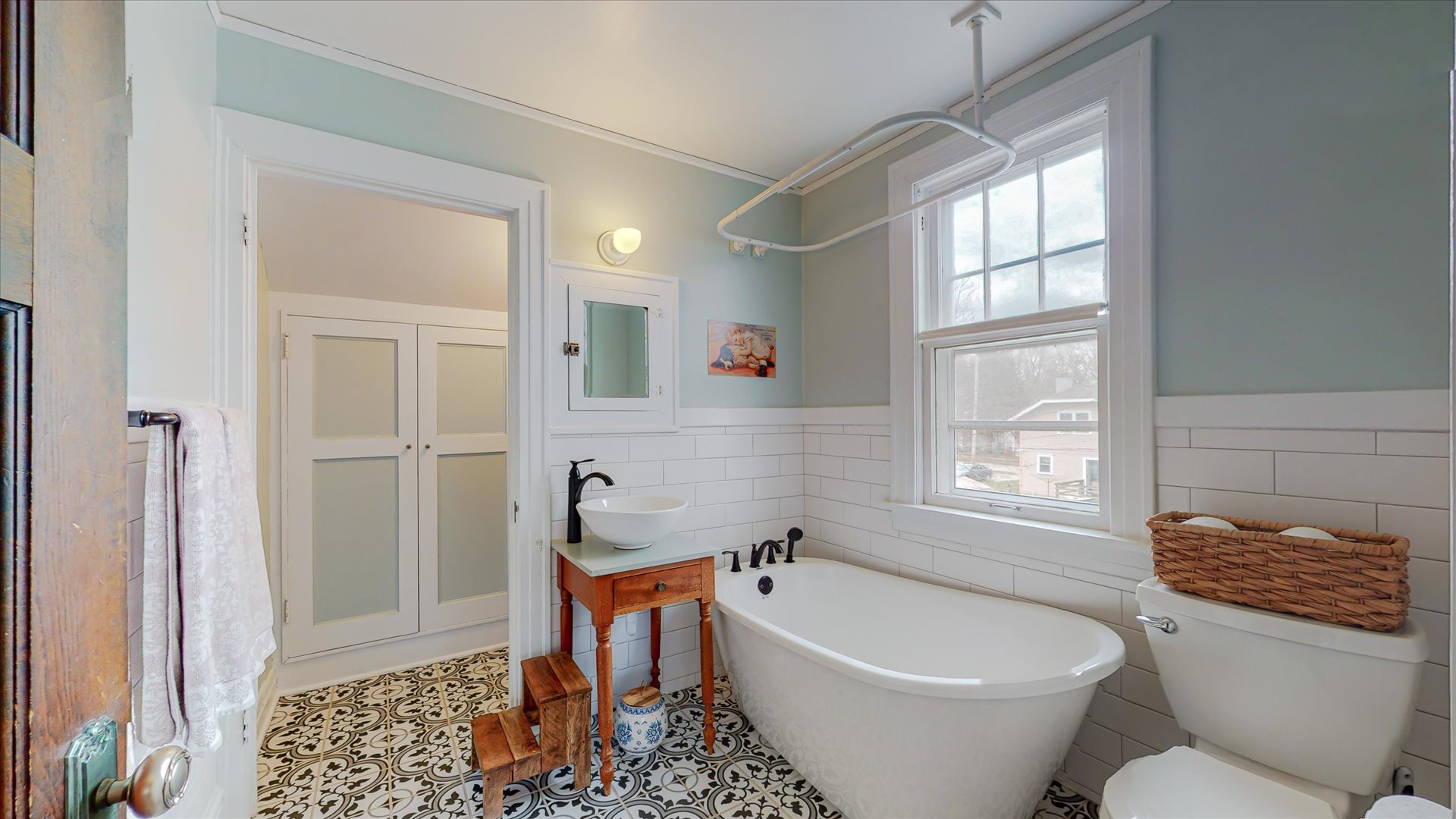 506 North Edwin Street Champaign, IL 61821 - Photo 29 of 45 a bathroom with a toilet bathtub and window