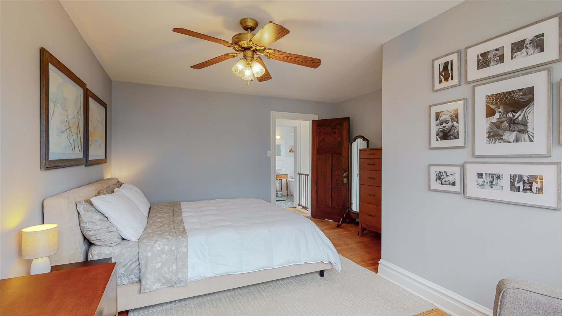 506 North Edwin Street Champaign, IL 61821 - Photo 33 of 45 a bedroom with a bed and a chandelier