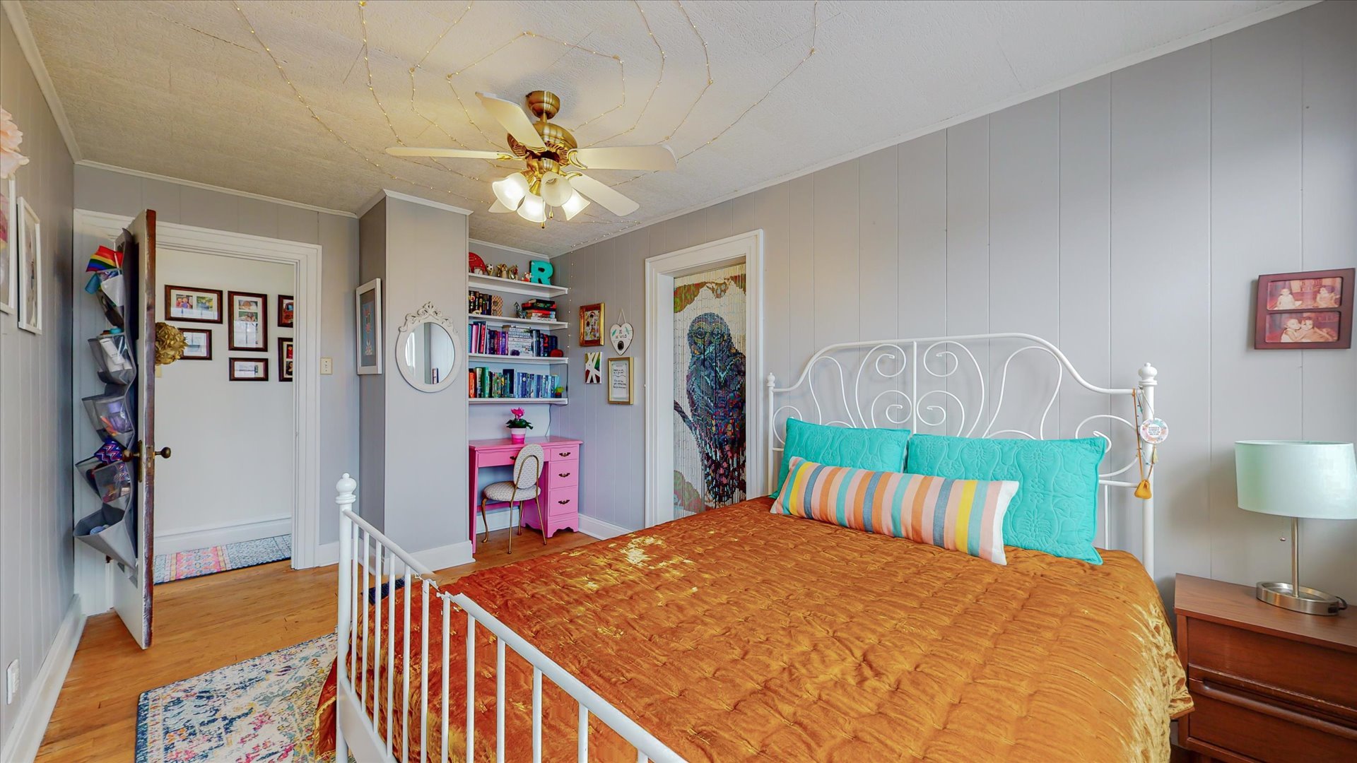 506 North Edwin Street Champaign, IL 61821 - Photo 35 of 45 a bedroom with a bed a dresser and book shelf