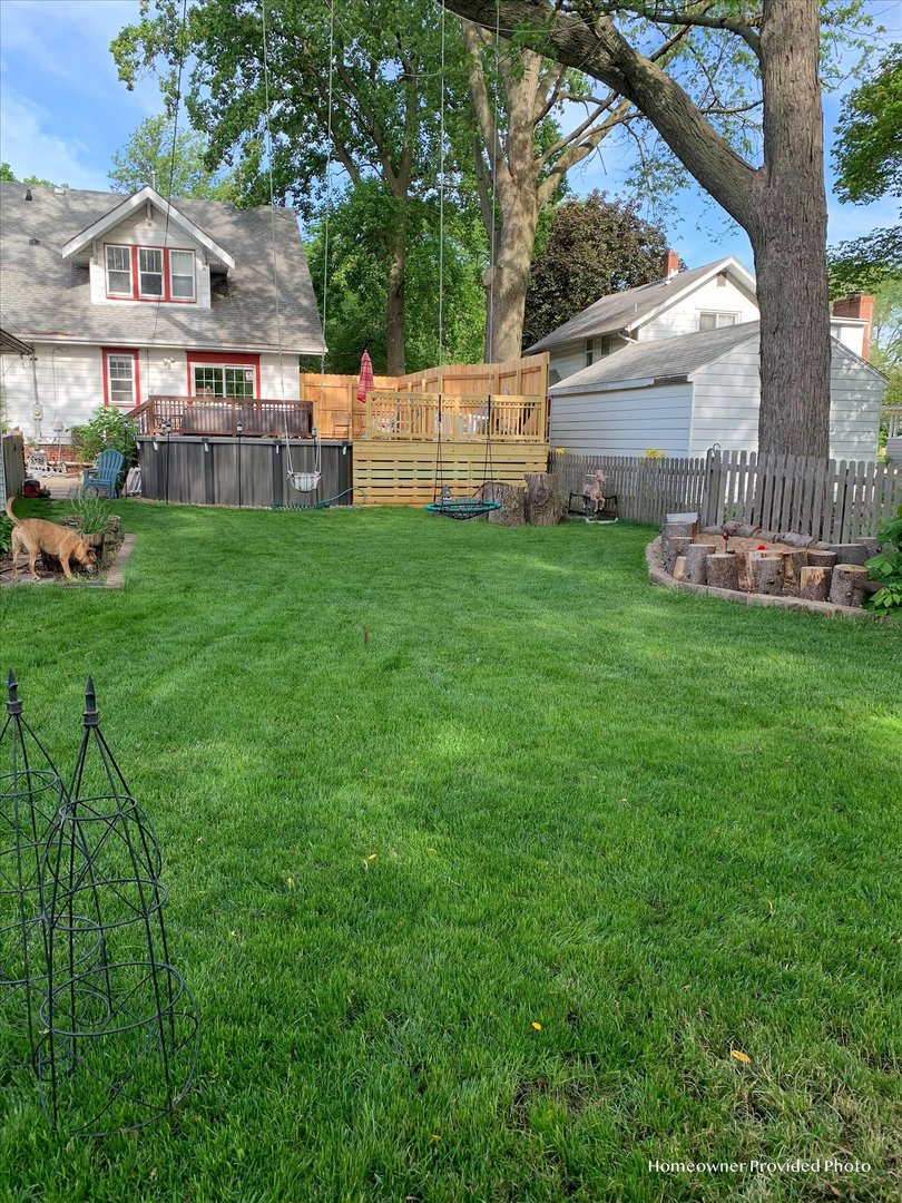 506 North Edwin Street Champaign, IL 61821 - Photo 40 of 45 a view of a house with backyard and a garden