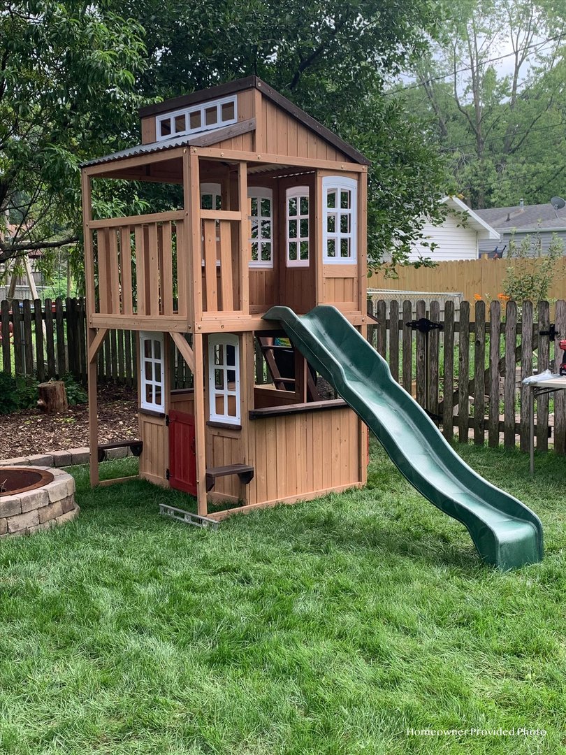 506 North Edwin Street Champaign, IL 61821 - Photo 45 of 45 a view of a house with wooden deck and a yard