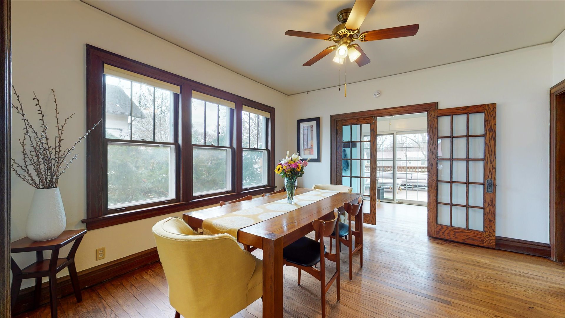 506 North Edwin Street Champaign, IL 61821 - Photo 6 of 45 a view of a dining room with furniture window and wooden floor