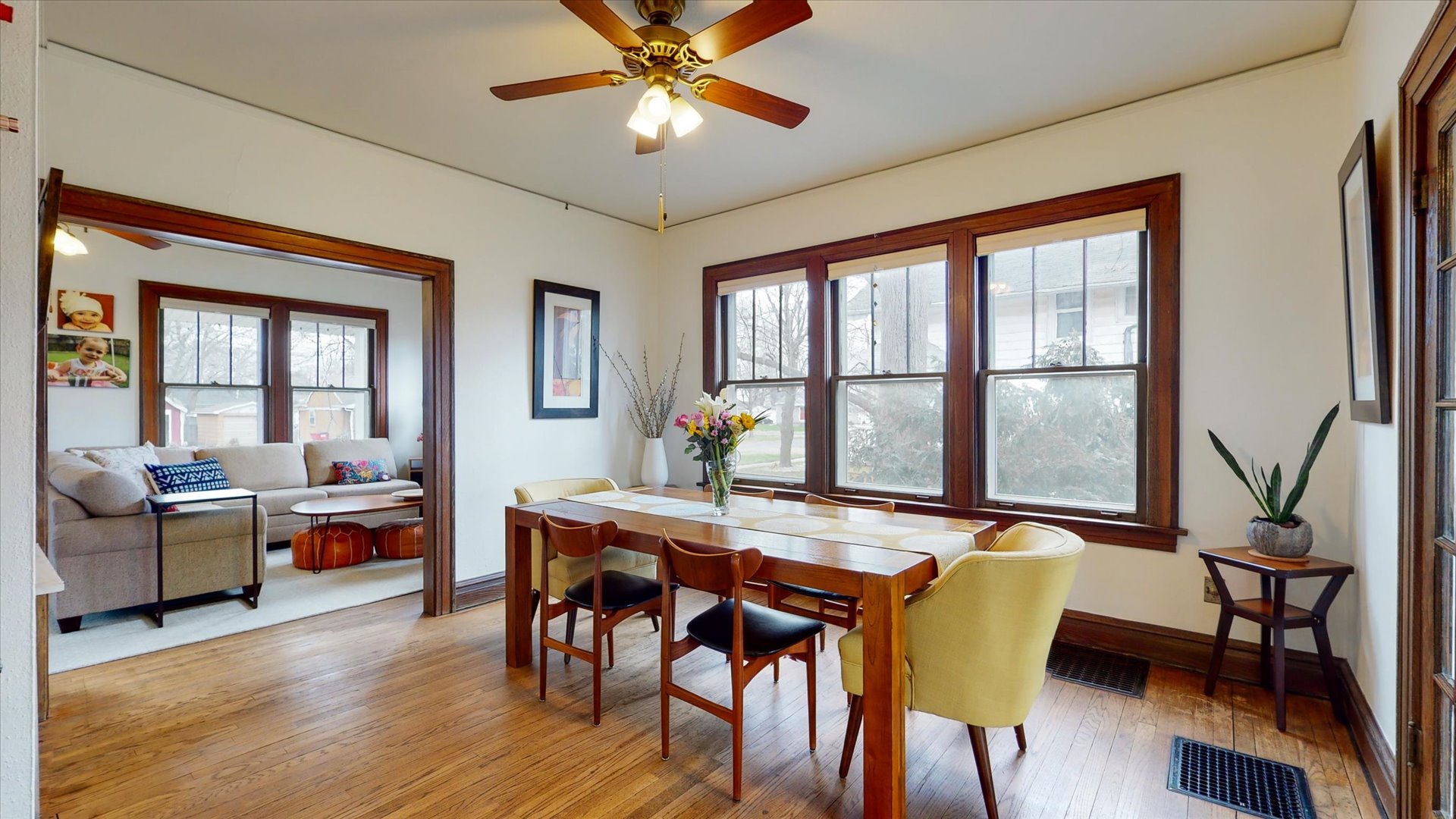 506 North Edwin Street Champaign, IL 61821 - Photo 8 of 45 a view of a dining room with furniture window and wooden floor