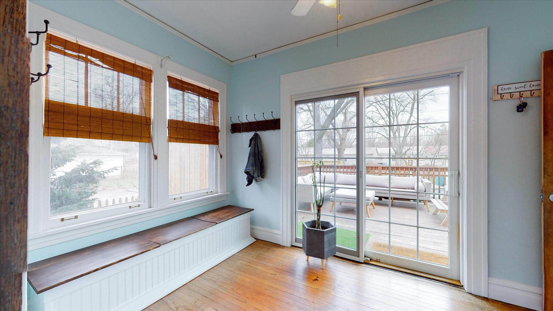506 North Edwin Street Champaign, IL 61821 - Photo 10 of 45 a view of an empty room with wooden floor and a window