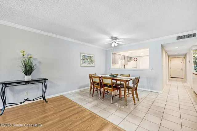 an aerial view of a house with a ocean view
