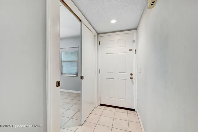 a kitchen with cabinets appliances a sink and a counter top space