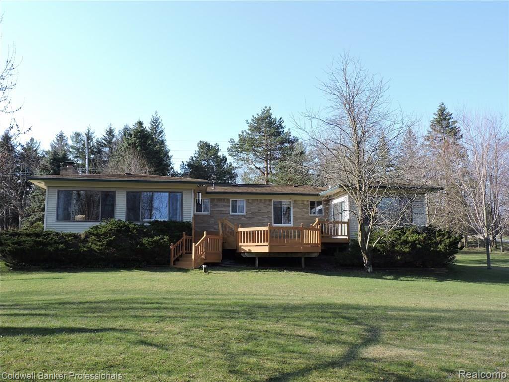 7000 Oakhill Road Clarkston, MI 48348 - Photo 1 of 47 Enjoy the natural vista on your gorgeous deck!