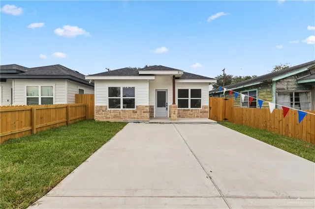 front view of a house with a patio