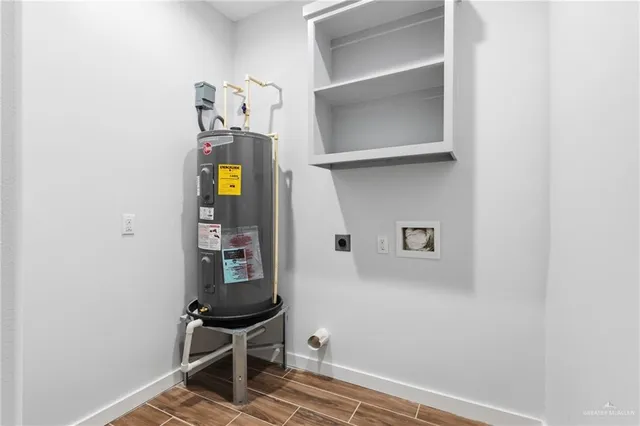 a room with cabinets and wooden floor