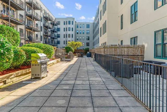 a view of a pathway with a buildings