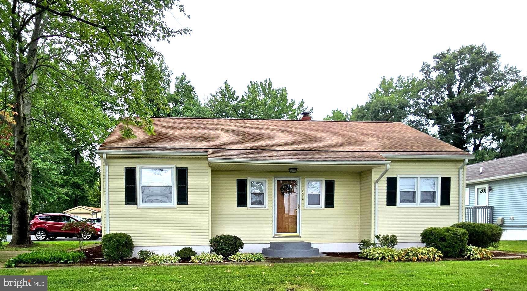 2414 Willoughby Beach Road Edgewood, MD 21040 - Photo 1 of 35 a front view of a house with a yard