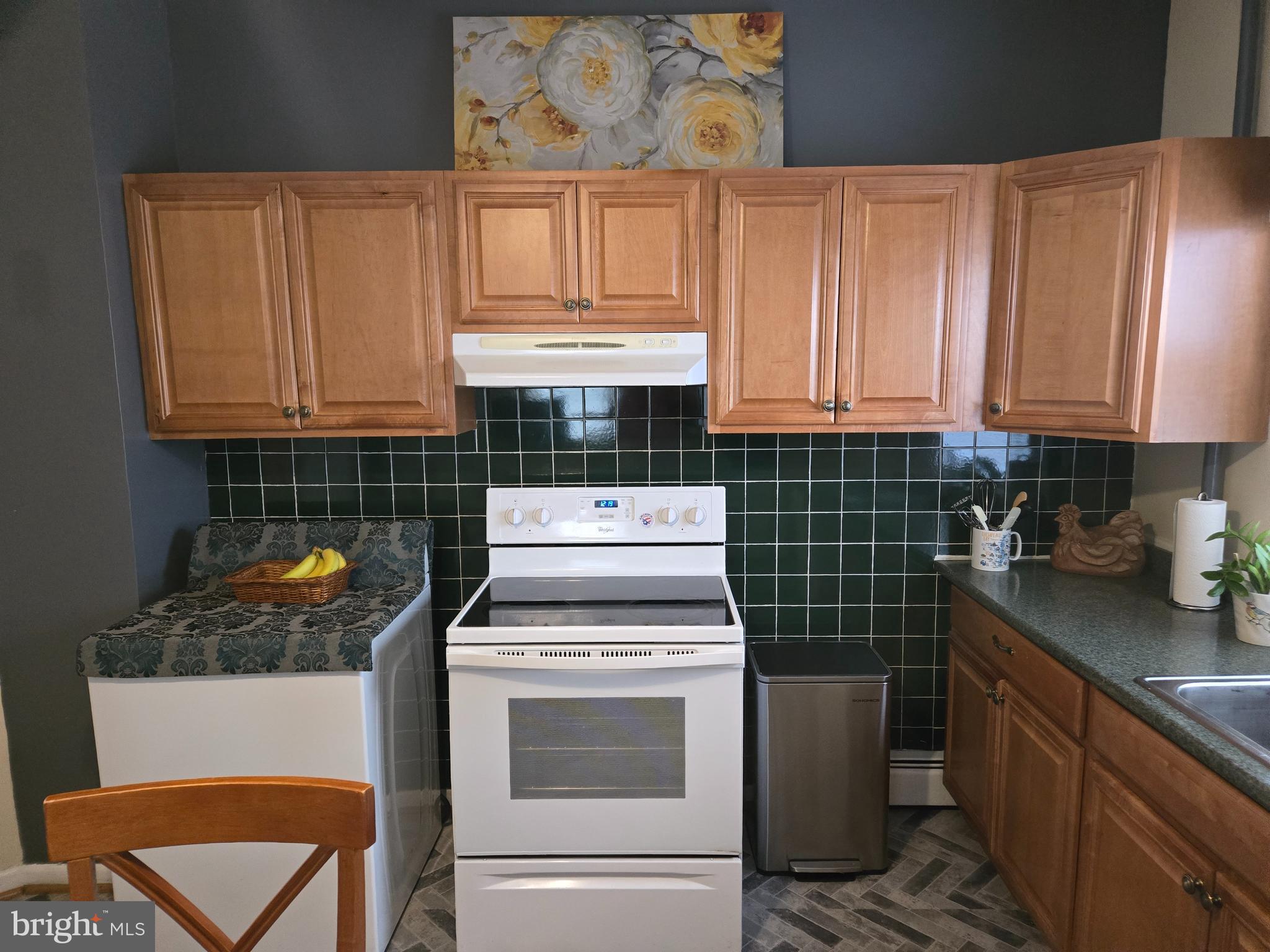 2414 Willoughby Beach Road Edgewood, MD 21040 - Photo 15 of 35 a kitchen with a stove and cabinets