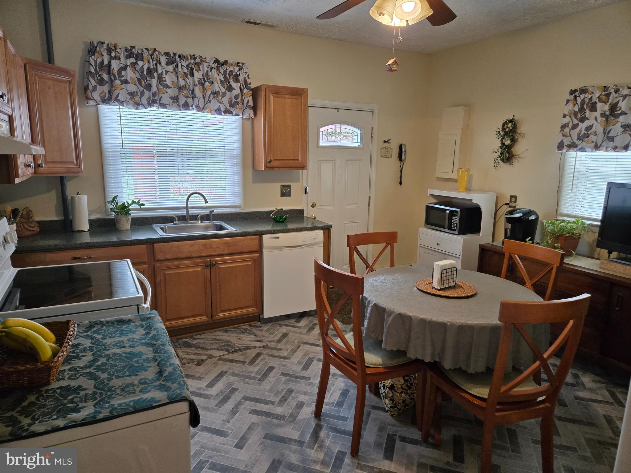 2414 Willoughby Beach Road Edgewood, MD 21040 - Photo 18 of 35 a view of a dining room with furniture and chandelier