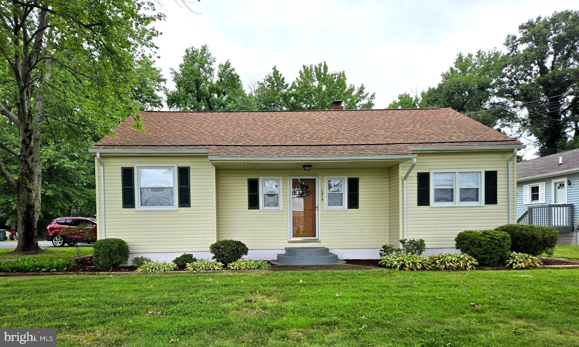 2414 Willoughby Beach Road Edgewood, MD 21040 - Photo 2 of 35 a front view of a house with a yard